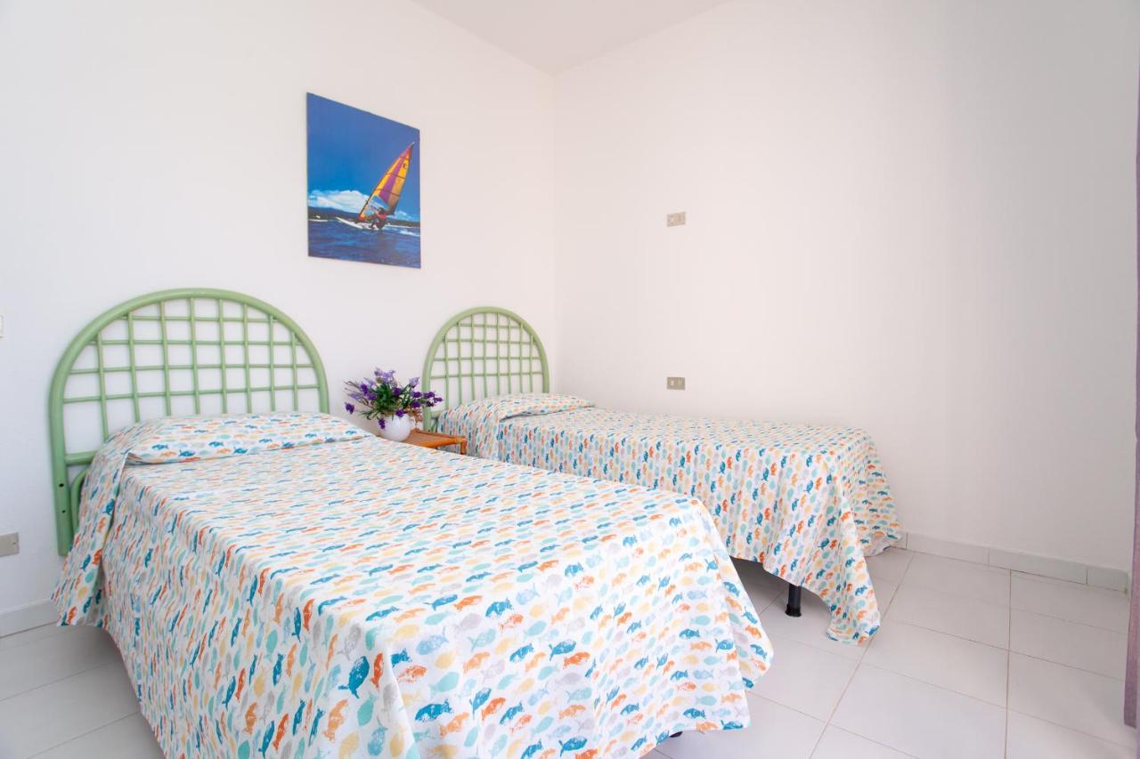 Residence Cinta 5 San Teodoro  Bagian luar foto